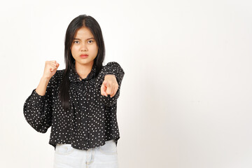Pointing at you with angry gesture Of Beautiful Asian Woman Wearing Black Isolated On White...