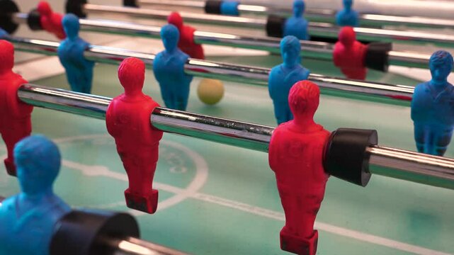 A man practices kicker table football throws, Recreation and leisure concept. Saint Petersburg, Russia - 6 Apr 2025