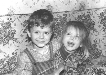 happy kids on a sofa, Odessa USSR 1980s