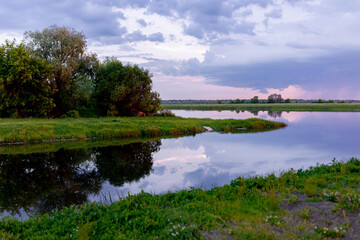 Evening view of the lake Staraya Tish. Fishing village, Ryazan, Russia, June 6, 2024.
