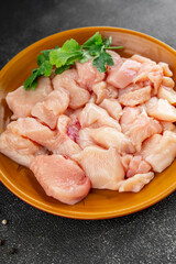 Chicken raw meat pieces of meat poultry tasty fresh delicious gourmet food background on table rustic food top view copy space keto and paleo diet