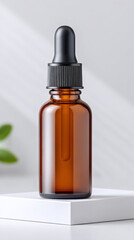 Amber dropper bottle on white cube, showcasing sleek design with black cap, perfect for essential oils or serums