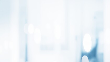 Abstract blurred background with white and blue tones for soft elegant effect.