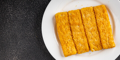 Fish sticks seafood fish fingers dish fresh gourmet food background on table rustic food top view copy space pescetarian diet