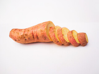 Organic Sweet Potatoes Close-Up on white background
