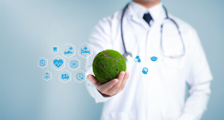 Healthcare Professional Holding Green Earth with Health Icons