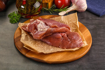 Raw uncooked turkey thigh fillet