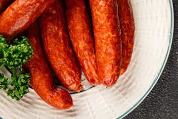 Sausage smoked pork meat beef dish fresh gourmet food background on table rustic food top view copy space
