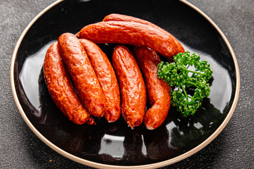 Sausage smoked pork meat beef dish fresh gourmet food background on table rustic food top view copy...