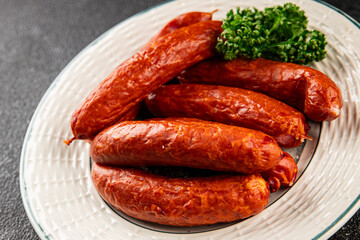 Sausage smoked pork meat beef dish fresh gourmet food background on table rustic food top view copy space