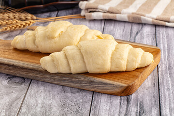 Raw uncooked croissant for bake