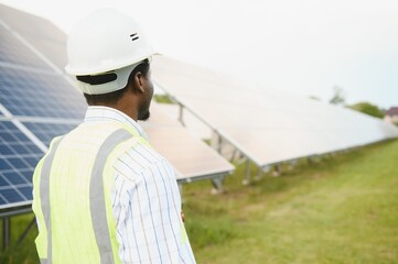 Man, engineer and solar panel on a farm for renewable energy, sustainability and eco environment