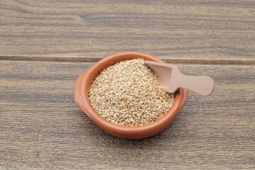 sesame buckwheat in a wooden spoon