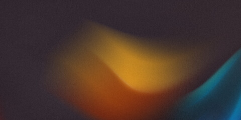 Abstract background with blurred shapes of orange yellow and blue on a dark gradient backdrop