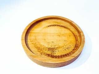 Wooden kitchen plates with wood marks isolated on white background