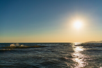 landscape with sunset at the sea on the coast