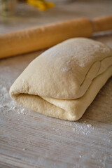 homemade puff pastry on wooden board
