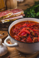 Borscht in a plate on the table