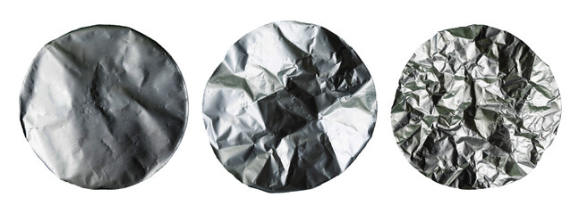 collection of round wrinkled silver paper on white background isolated