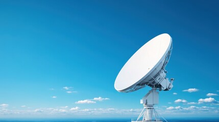 Modern Satellite Dish Antenna Against Clear Blue Sky with Fluffy White Clouds in the Background