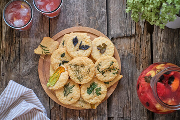 cheese cookies with different types of aromatic herbs, edible flowers