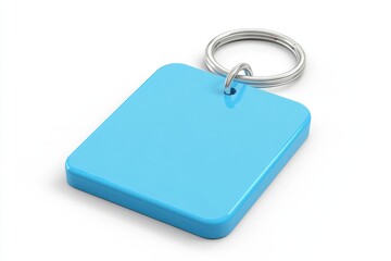 Fototapeta premium A light blue square keychain with a silver ring isolated on white background