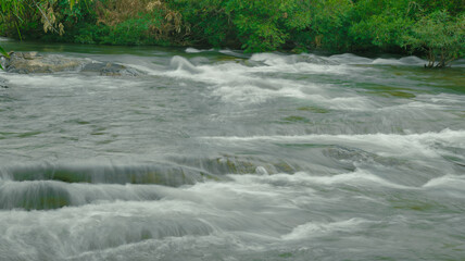 water flowing into the river
