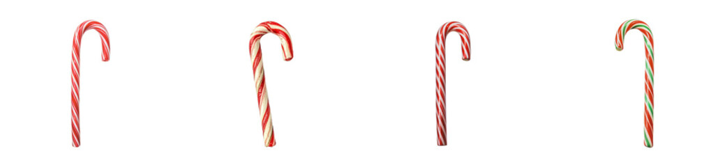 Obraz premium Four festive candy canes in various patterns for holiday celebrations, cut out - stock png