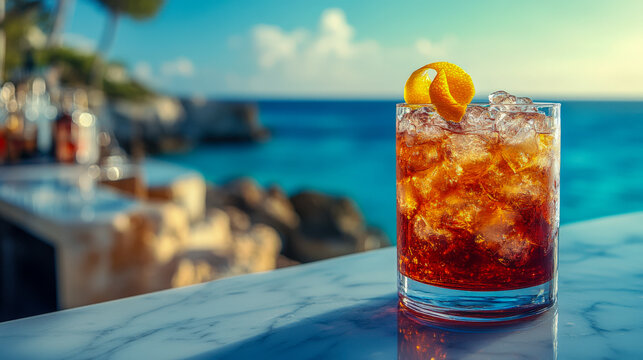 Refreshing cocktail by the ocean at a sunny seaside bar in the afternoon