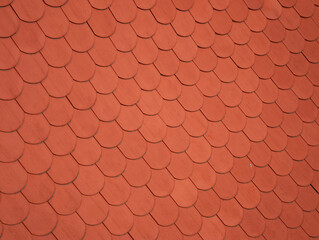 Red roof tiles creating a textured pattern 