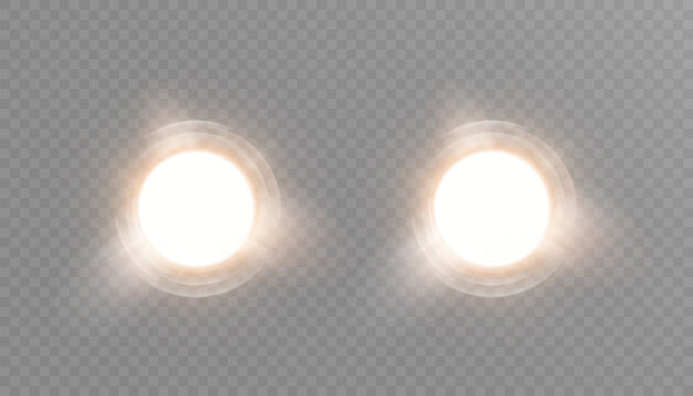Pair of warm glowing spotlight circles with radial light and soft haze on transparent background. Ideal for headlight effects, studio lighting, UI overlays, or ambient design accents.
