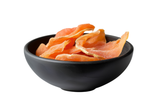 Modern Presentation: Dried Papaya Showcased in a Stylish Matte Black Dish Isolated On Transparent Background
