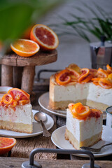 Blood Orange Cheesecake. Wooden background