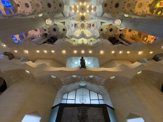 Stunning architectural details of the interior of a famous basilica showcasing intricate designs and lights