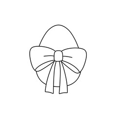 A white egg with a bow around it