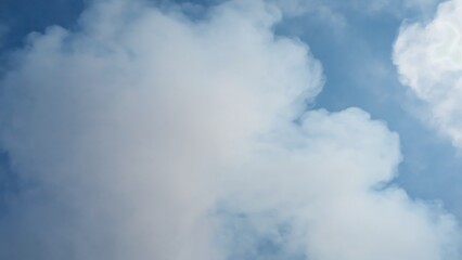 Obraz premium White clouds on blue sky