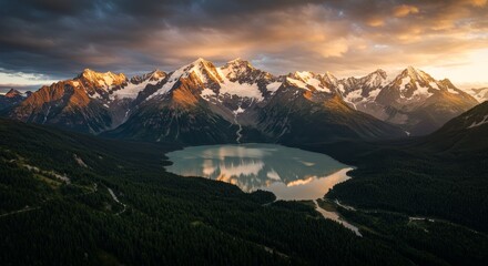 Obraz premium Majestic Mountain Lake Panorama at Sunrise - Serene mountain lake reflecting sunrise, snow-capped peaks, tranquil nature, peaceful landscape, breathtaking view