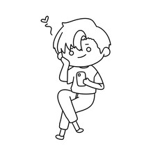 A boy is sitting on the floor with his phone in his hand