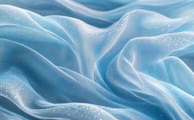 A delicate, translucent fabric is captured in a close-up, softly flowing in hues of aqua and blue to create a serene and dreamy ambiance with subtle shimmering particles that reflect light