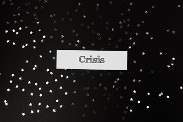Black background with a white word Crisis written on it