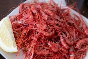 Boiled camarones little red shrimps on plate in restaurant La Palma Canary islands Spain