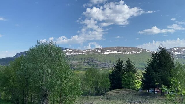 Summer landscapes from Hovdsundet and Trollvika near Bod&oslash;, Nordland. Captured in May 2024 &mdash; green fields, dramatic mountains, and the shimmering northern sea under a clear blue sky.