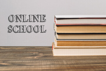 Stack of books with the word online school written on top