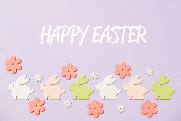 Colorful Easter bunny decoration with a purple background