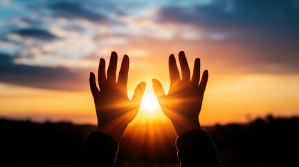 Hands reaching for the sun during a stunning sunset, capturing a moment of connection between humanity and nature.