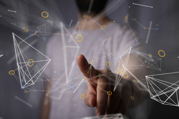 Abstract image of a person interacting with a digital network, showcasing connection and technology.