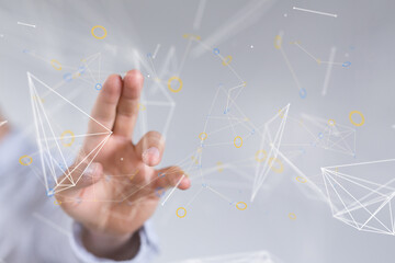 Abstract image of a hand interacting with a digital network.  Perfect for technology, connection, and innovation concepts.