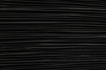 Obraz premium black pleated fabric texture, pattern, background. many small folds on fabric