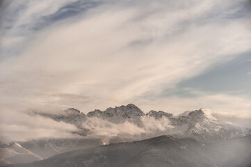 Misty peaks of the Tatra Mountains in winter - Zakopane Poland Tatra Mountains