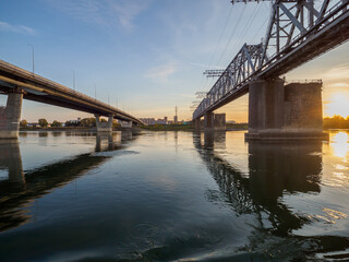 Bridges across the Ob River in Novosibirsk at sunset.